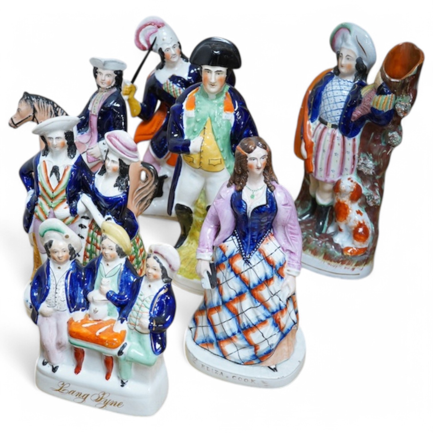 Seven Staffordshire flatback figures to include Eliza Cook and T. King, 31cm high. Condition - some restoration